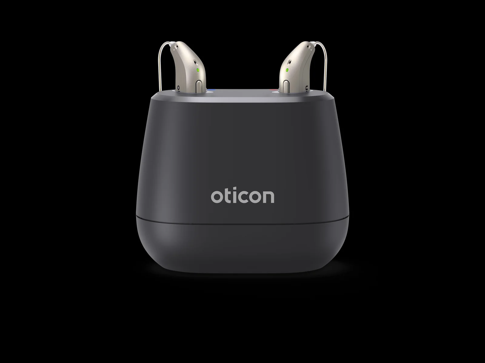 Oticon Intent hearing aids in their charging dock